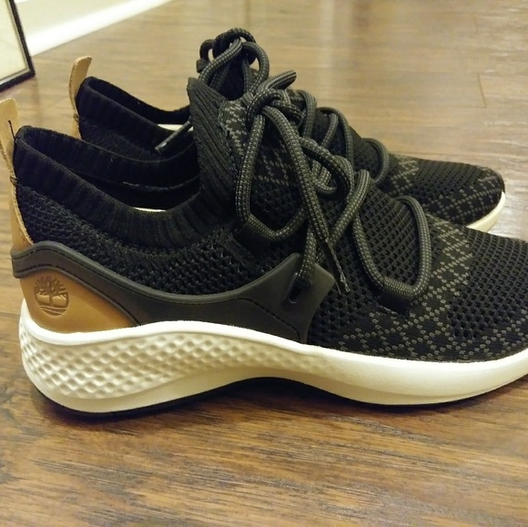 men's flyroam go knit sneakers navy blue